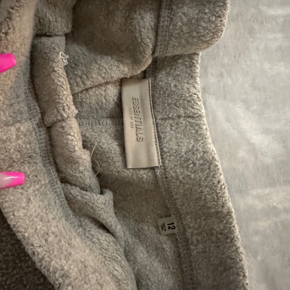 Fear of god Essentials set. Sweater and sweat pants. Never worn. Kids size 12